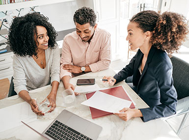 A group of people in a meeting