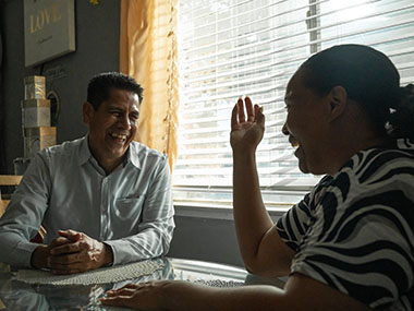 Two people talking