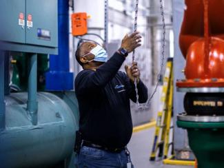 Freddie Mac facilities manager working in the boiler room
